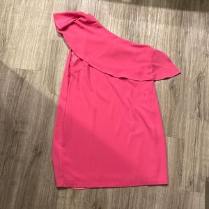 One shoulder hot pink dress.